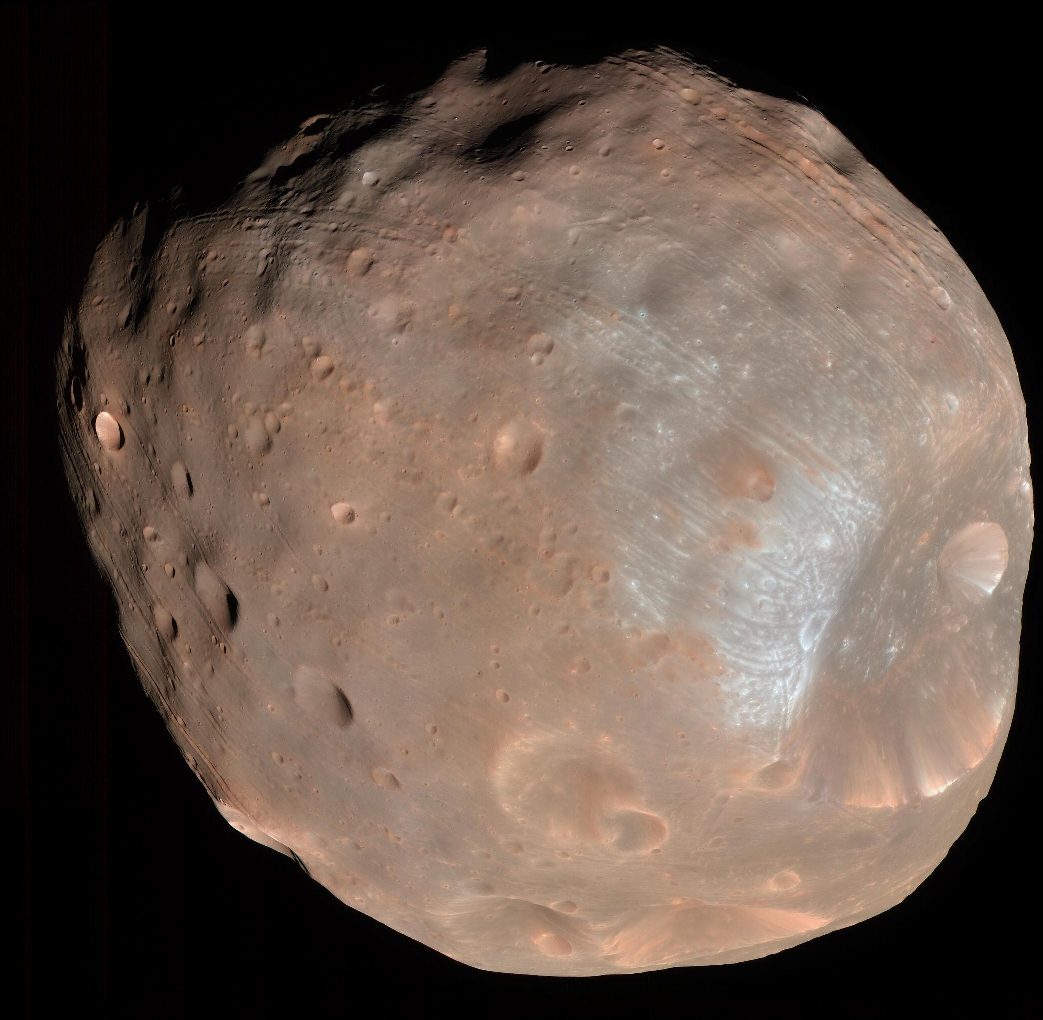 The High Resolution Imaging Science Experiment (HiRISE) camera on NASA's Mars Reconnaissance Orbiter took two images of the larger of Mars' two moons, Phobos, within 10 minutes of each other on March 23, 2008.